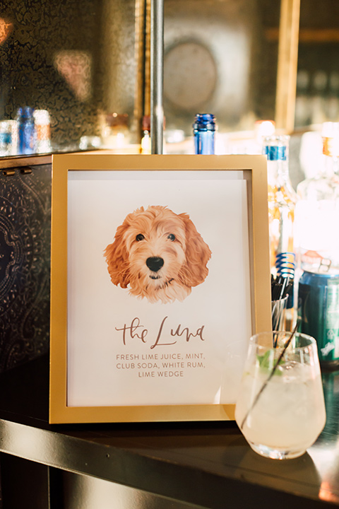 bar menu with a painting of their dog on it