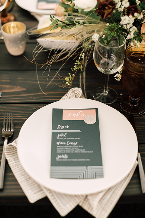 white linens with green table menus