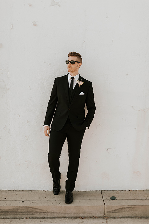  groom in a black suit