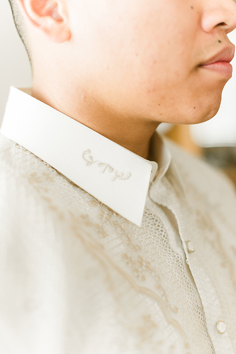  groom in an ivory cultural shirt