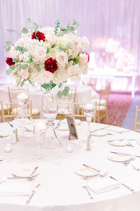  white table linens and gold flatware 