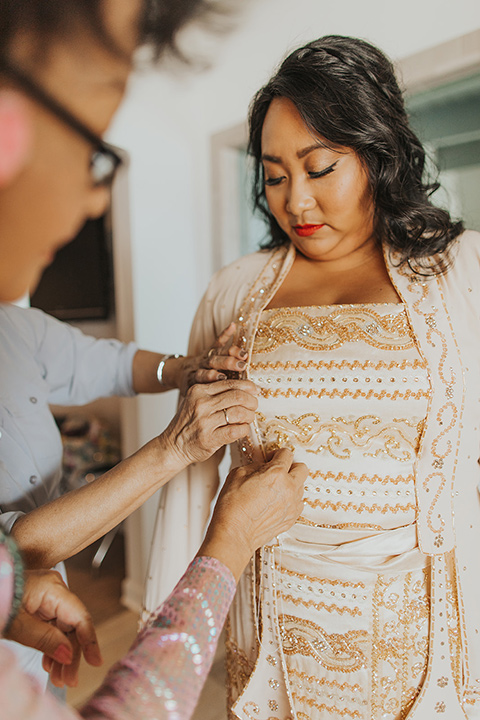  bride in a traditional Burmese gown 