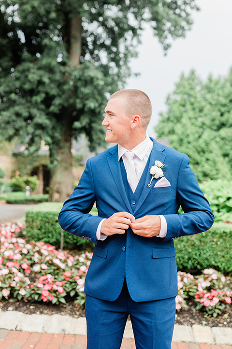  the groom in a cobalt blue suit