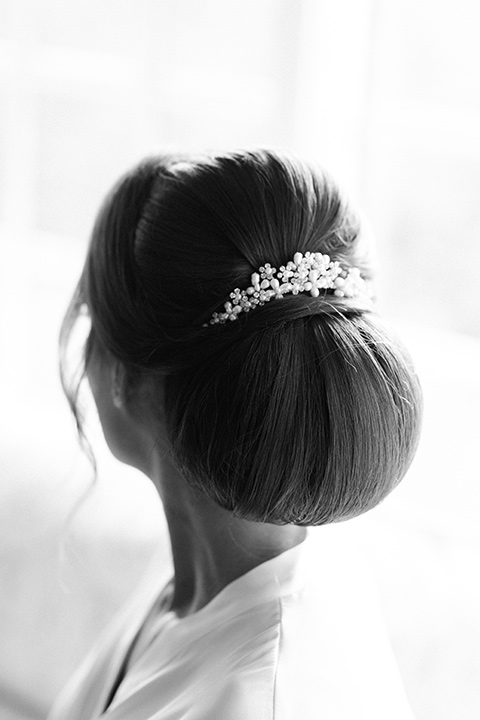  bride in a white modern lace gown with a cathedral veil 