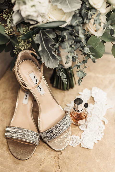  bridal shoes with white flowers 