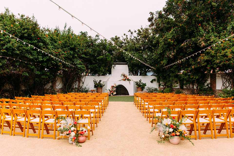  ceremony space with wooden chairs and fireplace