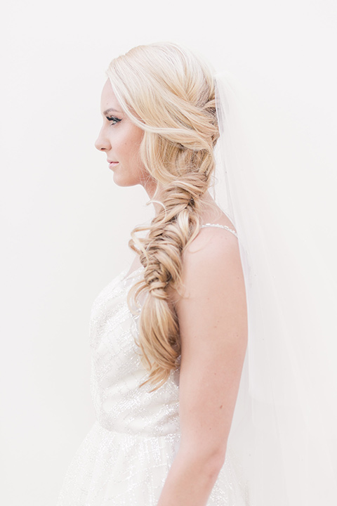  bride in a loose French braid 