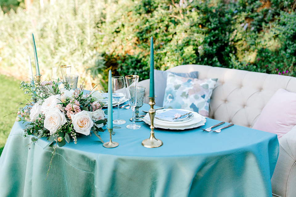  blue linens with white flatware 