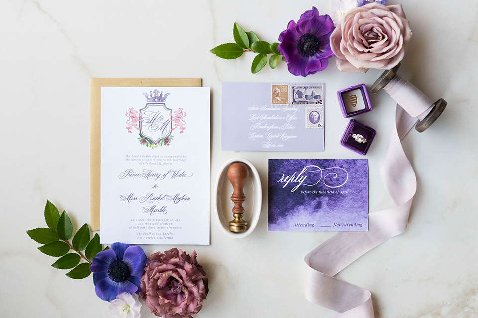  white invitations with purple details