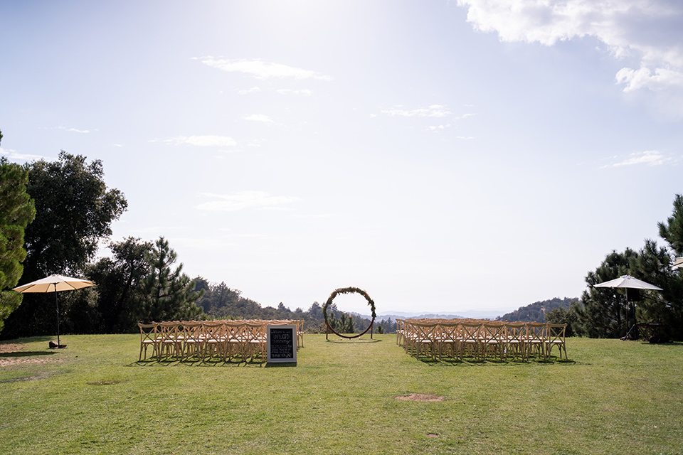  ceremony space with a circular arch and long benches 