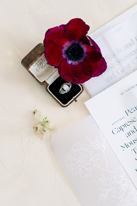  white plates and red linens