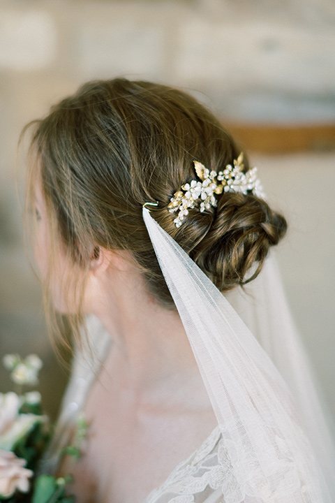 bride in a white long ball gown with tulle train and long cathedral veil