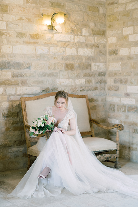  bride in a white long ball gown with tulle train and long cathedral veil 