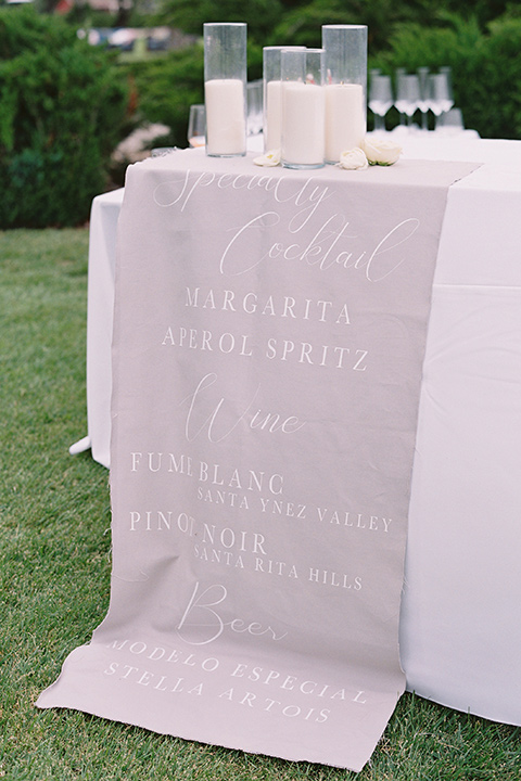  white table linens with candles