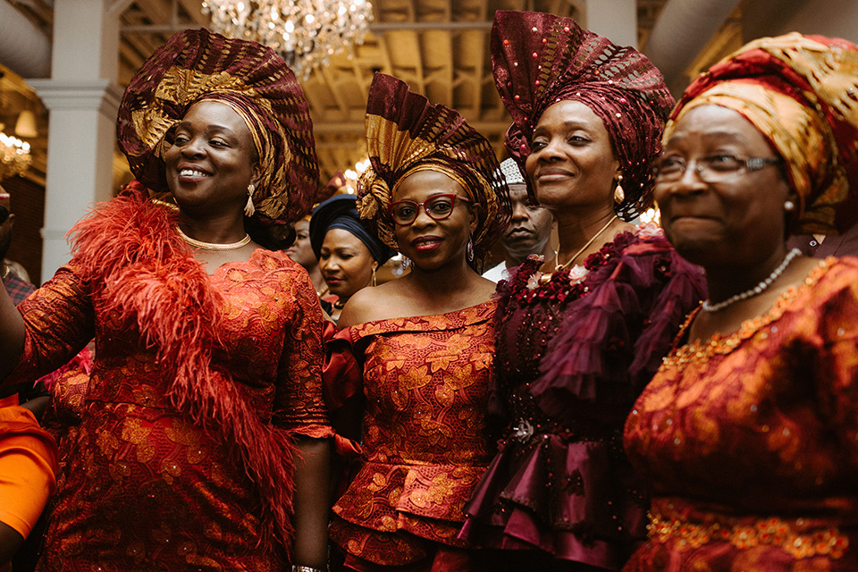 women in traditional African gowns and headdresses