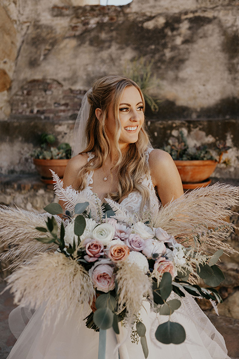 bride in a white ballgown with a lace bodice