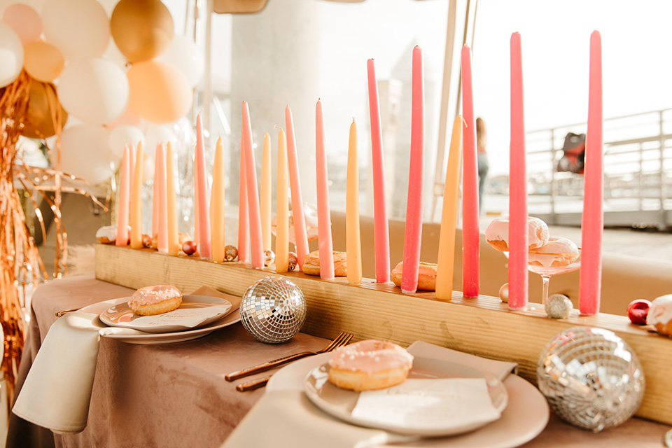  1970s golden hour boat elopement – candles and decor 