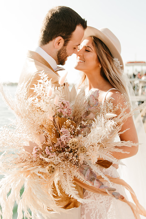  1970s golden hour boat elopement – couple close 