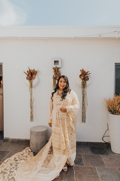  bride in a golden Burmese gown