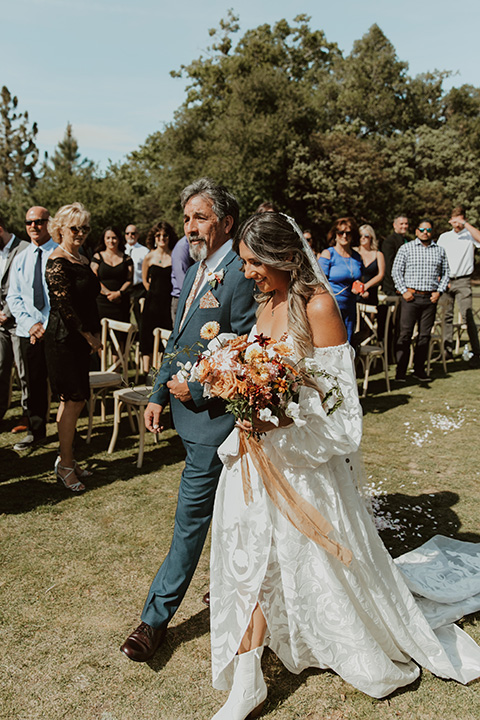  bride walking down the aisle with her father  