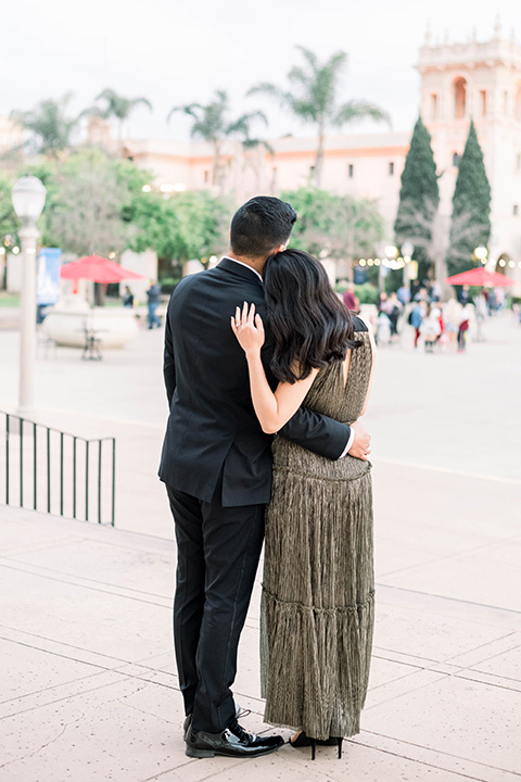  bride and groom eloping at balboa park –holding each other