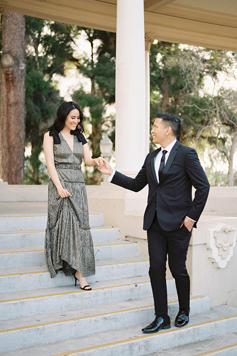  bride and groom eloping at balboa park – holding hands