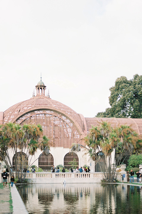  bride and groom eloping at balboa park – holding hands