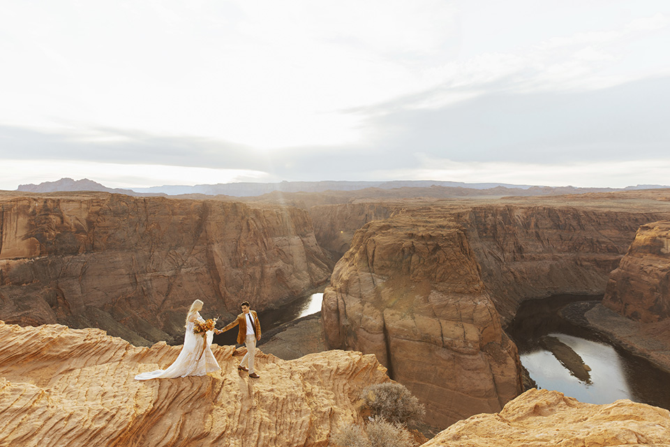  bohemian elopement in antelope canyon – couple on canyon 