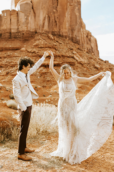  bohemian elopement in antelope canyon – couple twirling 