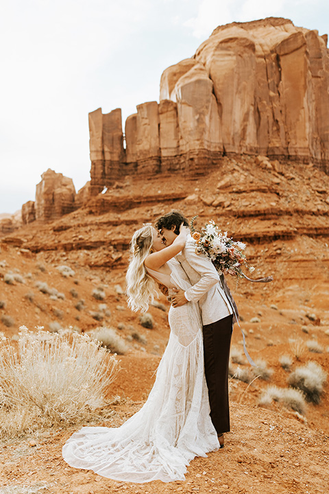  bohemian elopement in antelope canyon – couple twirling 