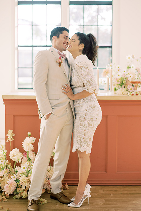  building 177 romantic coral wedding – couple at bar in short dress 