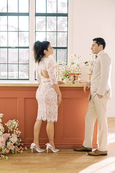  building 177 romantic coral wedding – couple cheersing