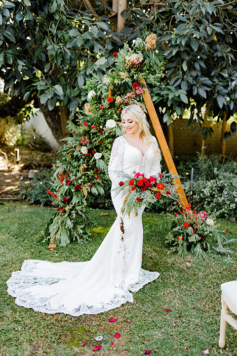  Christmas styled shoot with the bride in a formfitting gown with long sleeves 