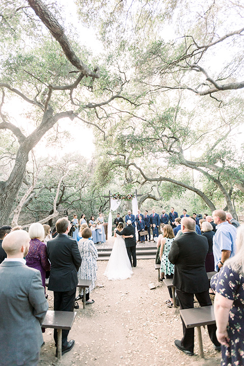 father of the bride in a black tuxedo