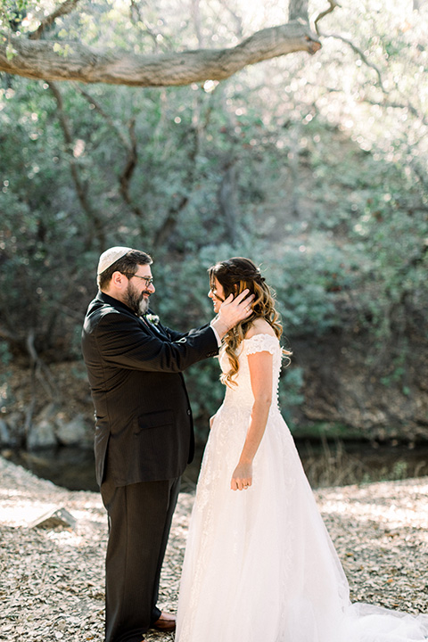 father of the bride in a black tuxedo