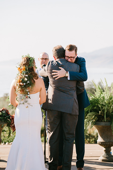 father of the bride in a charcoal grey suit 