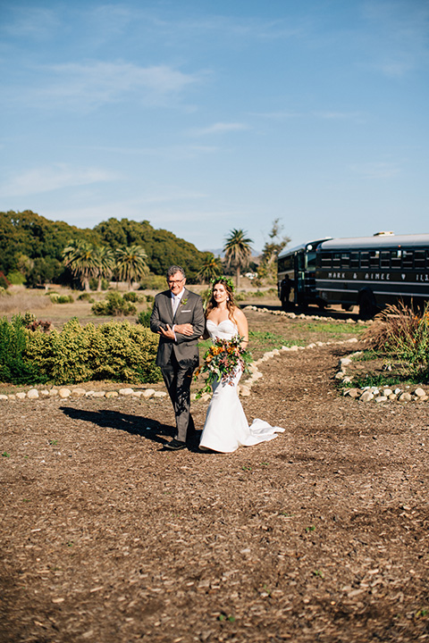  father of the bride in a charcoal grey suit 