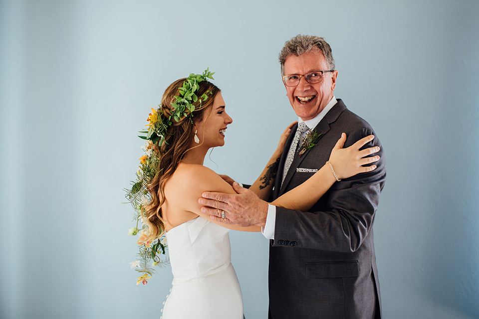  father of the bride in a charcoal grey suit 