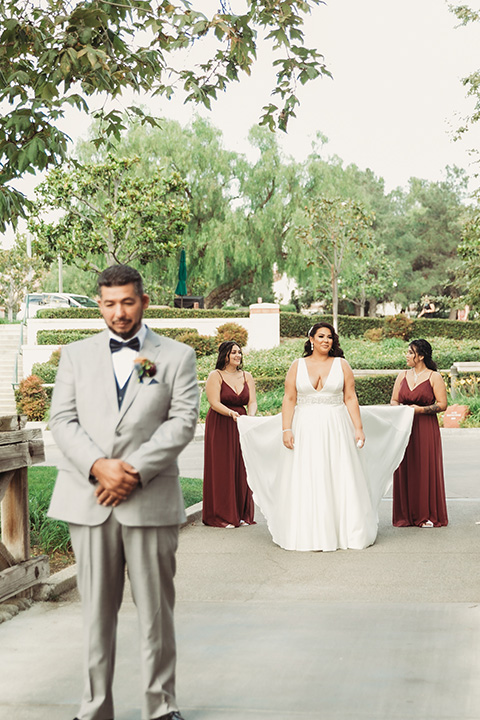  father of the bride in a light grey suit 