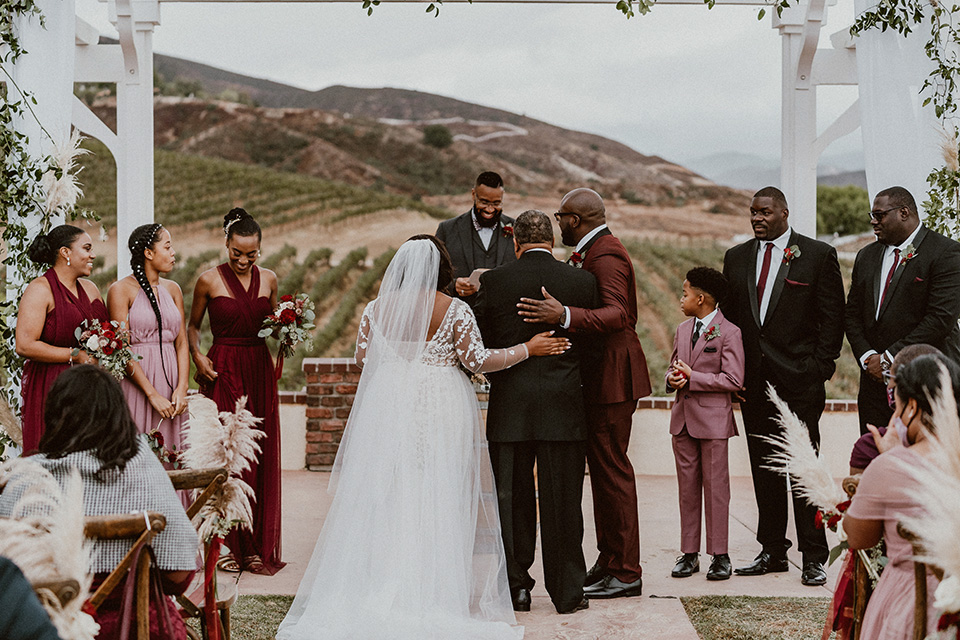  father of the bride in a black velvet tuxedo  