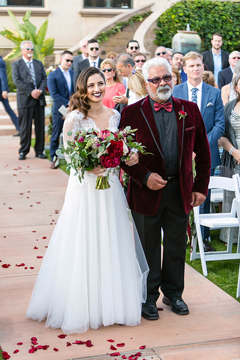  father of the bride in a light grey suit 