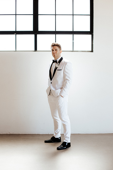  alleylujah neutral wedding – bride in a modern white gown and the groom in a white shawl lapel tuxedo