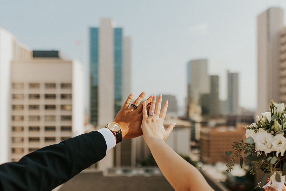  industrial wedding at the pannikin building in san diego with gold bridesmaids gowns and black tuxedos for the groom and groomsmen 