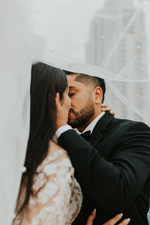  industrial wedding at the pannikin building in san diego with gold bridesmaids gowns and black tuxedos for the groom and groomsmen 