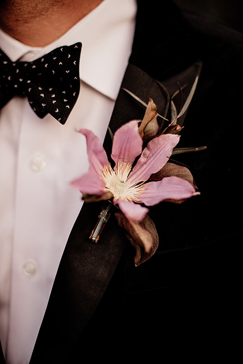  halloween inspired wedding with the groom in black velvet 