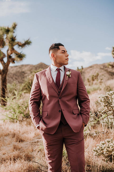  grooms in the same cobalt blue suit with 2 different color ties 