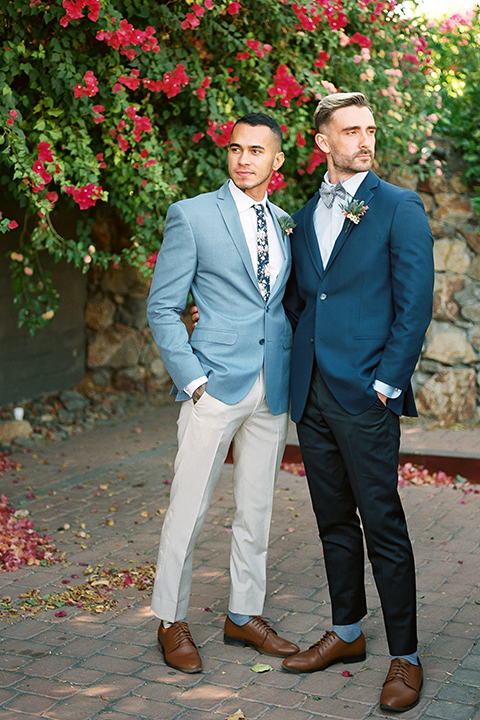  grooms in the same cobalt blue suit with 2 different color ties 