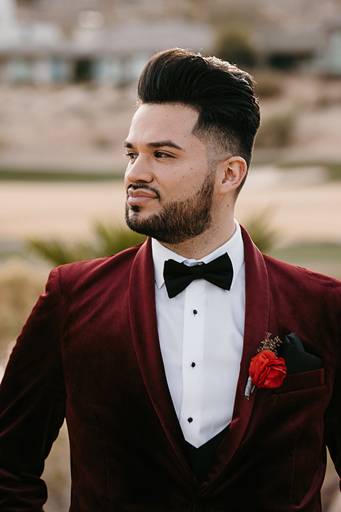  grooms in the same cobalt blue suit with 2 different color ties 