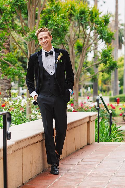  grooms in the same cobalt suit with 2 different color ties 