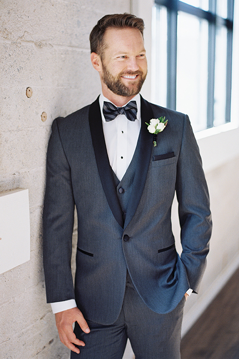  grooms in the same cobalt blue suit with 2 different color ties 